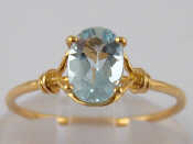 Appraisal: A yellow metal tests carat gold aquamarine ring the aquamarine