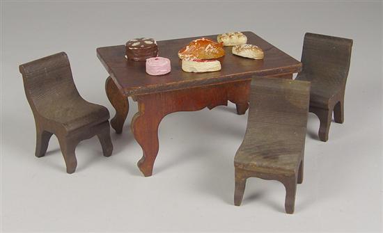 Appraisal: Doll House Furnishings Circa Dark wood table and three chairs