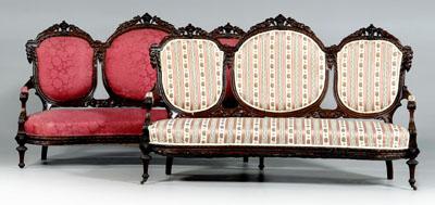 Appraisal: Pair rococo revival carved settees elaborately carved walnut frames with