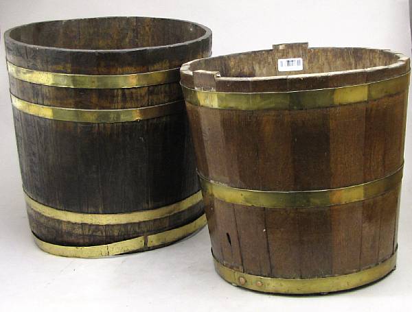 Appraisal: Two brass bound oak barrels heights and in