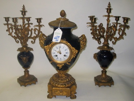 Appraisal: FRENCH THREE PIECE CLOCK SET the cobalt blue 'Sevres' porcelain