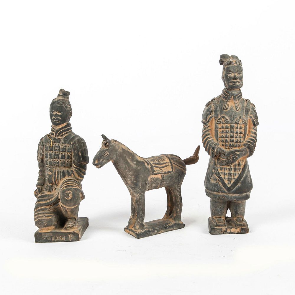 Appraisal: THREE JAPANESE EBONY CLAY FIGURES TWO MEN ONE HORSE Three