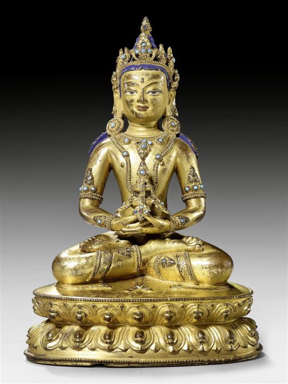 Appraisal: A GILT COPPER ALLOY FIGURE OF AMITAYUS HOLDING THE WATER