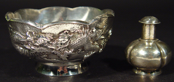 Appraisal: Chinese silver bowl cast with a continous band of dragons