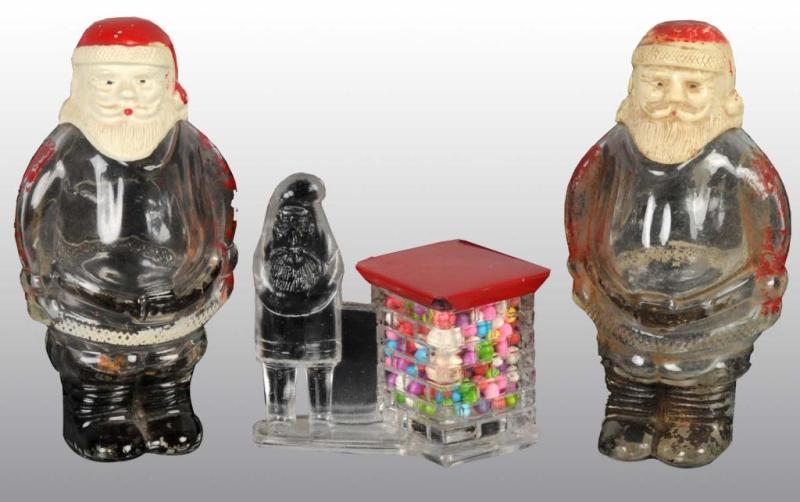 Appraisal: Lot of Glass Santa Candy Containers Description Includes rare Santa