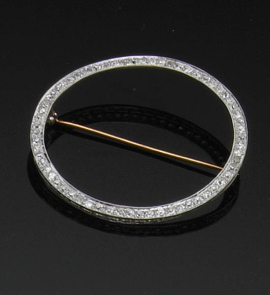 Appraisal: A diamond and platinum circle brooch platinum mount with gold