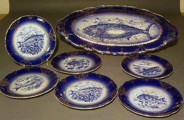 Appraisal: French porcelain blue fish platter x and six plates ea