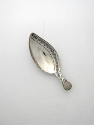 Appraisal: A George III 'leaf' caddy spoon with a 'hatched' stem