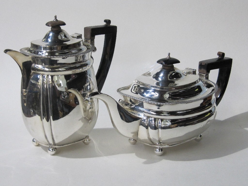 Appraisal: Silver teapot with matching hot water pot oz London