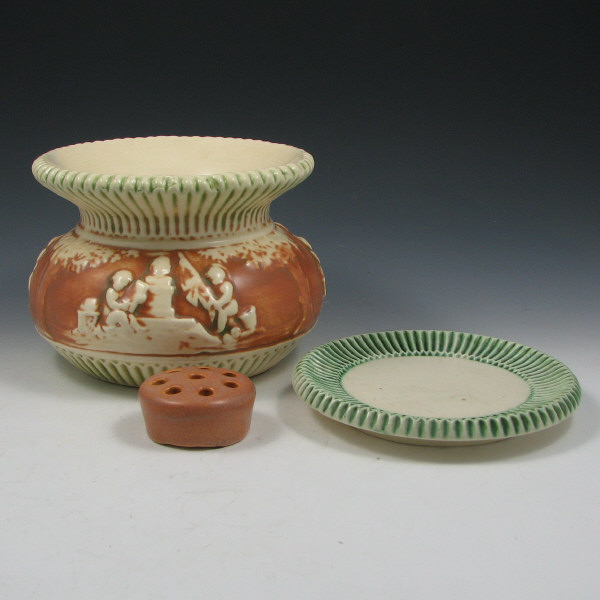 Appraisal: Lot of three Roseville pieces including a Roseville Donatello spittoon