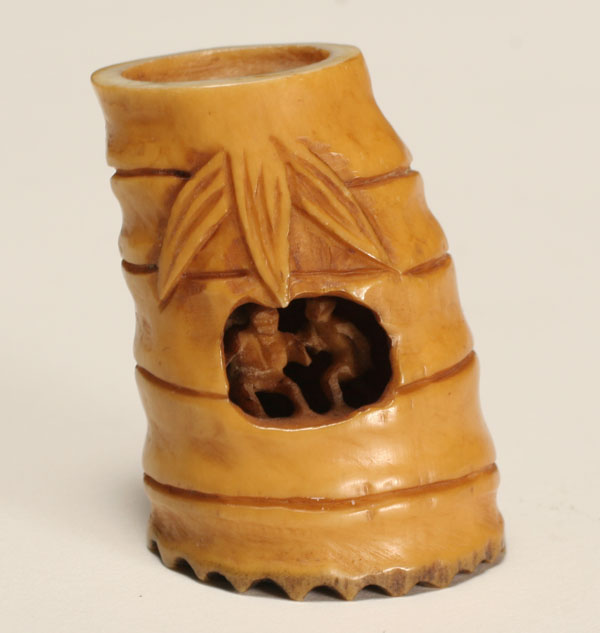 Appraisal: Japanese ivory netsuke in form of bamboo with two figures