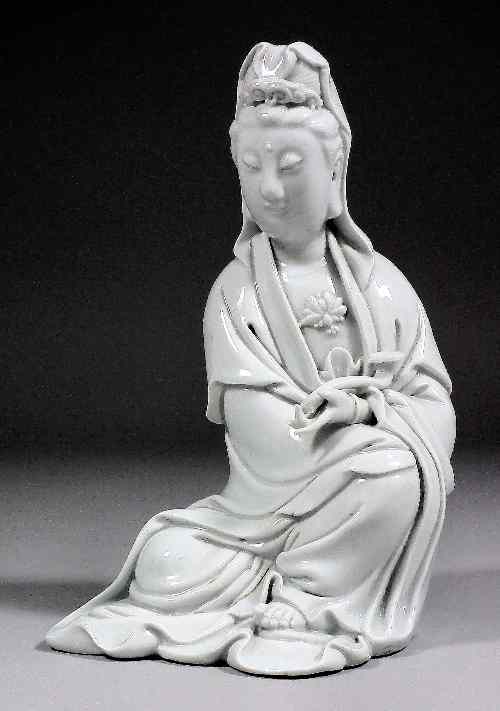 Appraisal: A Chinese porcelain blanc de chine model of a seated