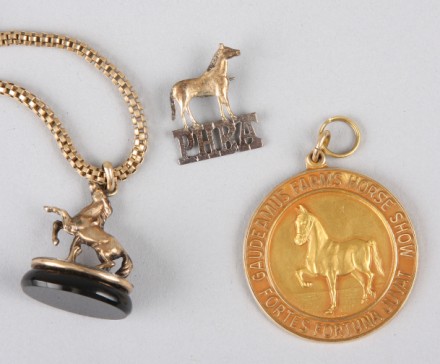 Appraisal: One horse fob on chain KY long chain pendant fob