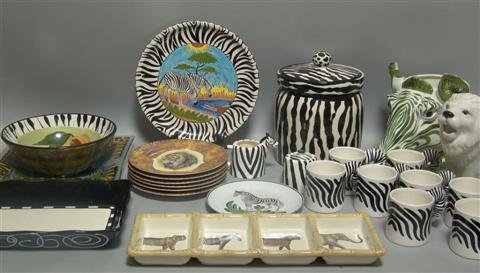 Appraisal: A COLLECTION OF SAFARI-THEMED CERAMICS Consisting of dessert plates a