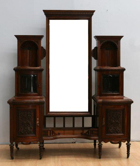 Appraisal: A late Victorian dressing table with carved decoration with retailers