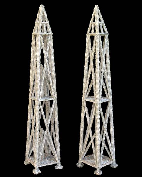 Appraisal: A pair of Italian shell encrusted wooden obelisks s en