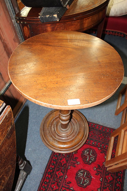 Appraisal: A CIRCULAR MARBLE-TOPPED OCCASIONAL TABLE on a carved mahogany tripod