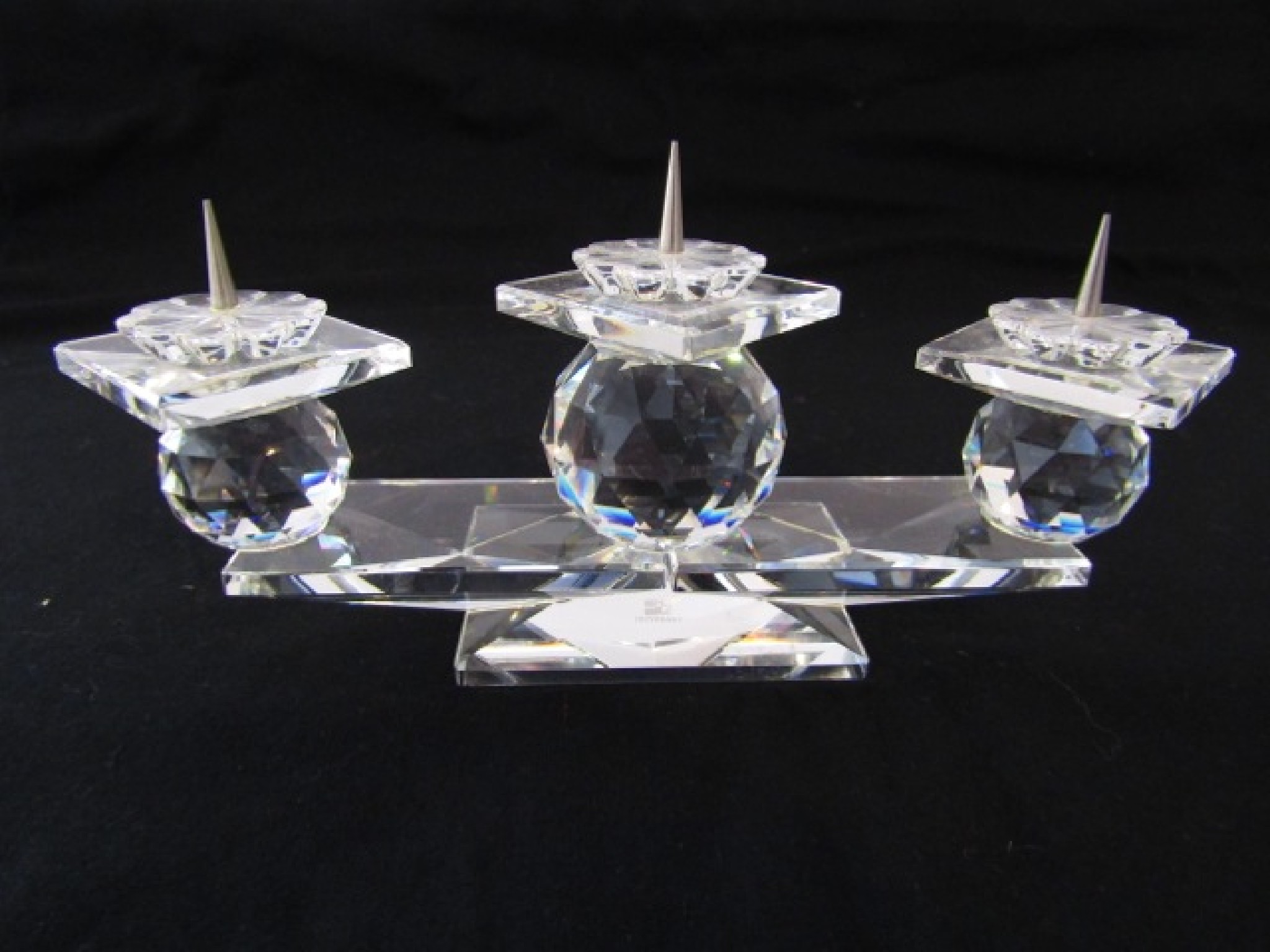 Appraisal: A Swarovski crystal three divisional candle stand in the form