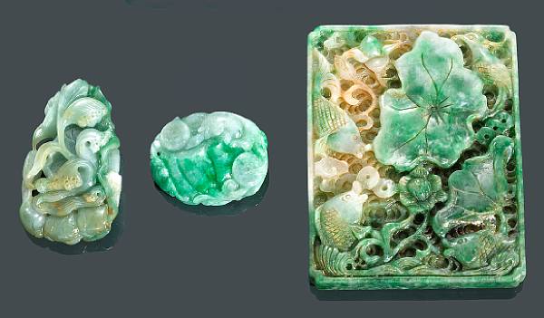 Appraisal: A group of three mottled green jadeite plaques The largest