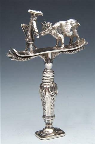 Appraisal: A DUTCH SILVER SMALL CORKSCREW SEAL the handle in the