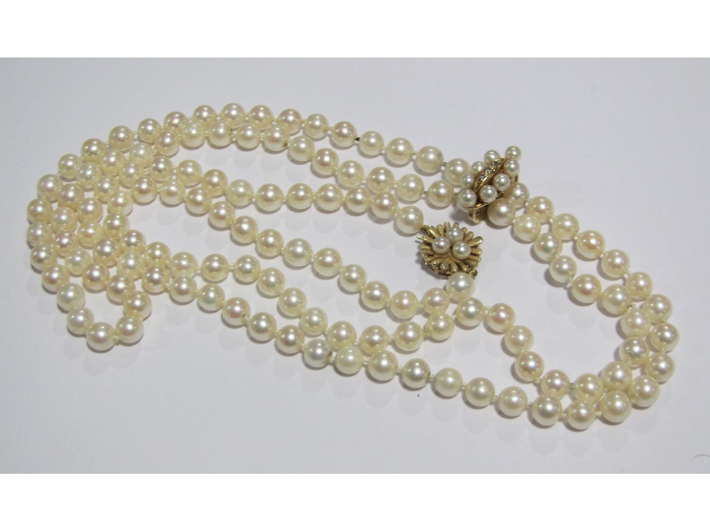 Appraisal: Long string of cultured pearls with gold diamond and pearl