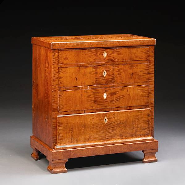 Appraisal: A Biedermeier flame birch chest of drawers early th century