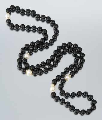 Appraisal: A Ladies' Onyx Pearl and Gold Necklace A single strand