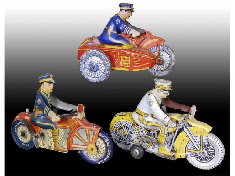 Appraisal: Lot of Marx Tin Wind-Up Police Motorcycle Toys Description Working