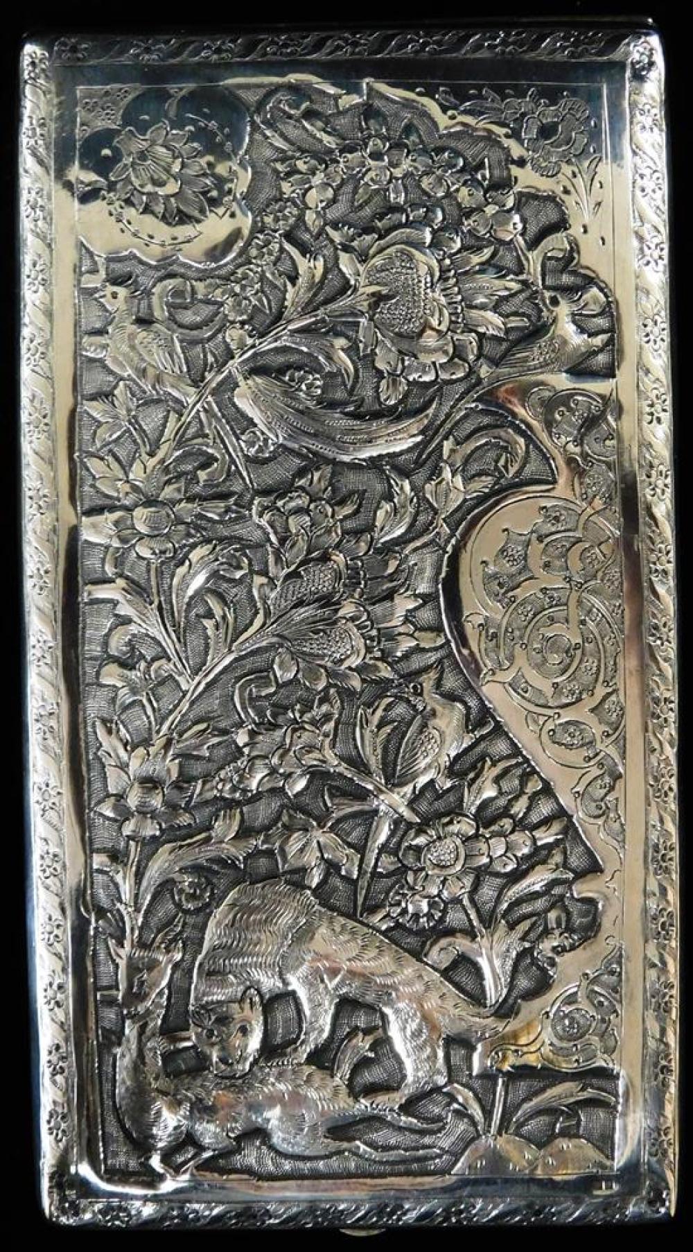 Appraisal: SILVER Cigarette case with Persian repousse design with lion and