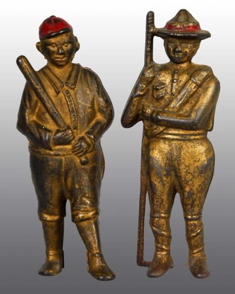 Appraisal: Lot of Cast Iron Figure Still Banks Description Includes baseball