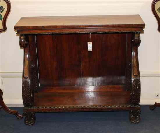 Appraisal: A Regency carved rosewood console table on scroll feet ft