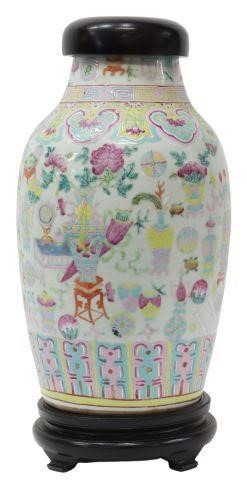 Appraisal: Chinese famille rose porcelain vase decorated with assorted architectural and