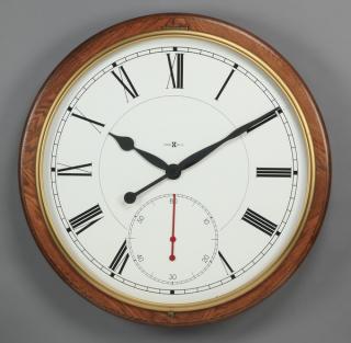 Appraisal: Wall clock by Howard Miller dia Wall clock by Howard