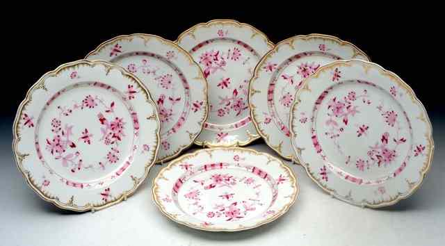 Appraisal: A SET OF ELEVEN BERLIN KPM WHITE GROUND PORCELAIN PLATES