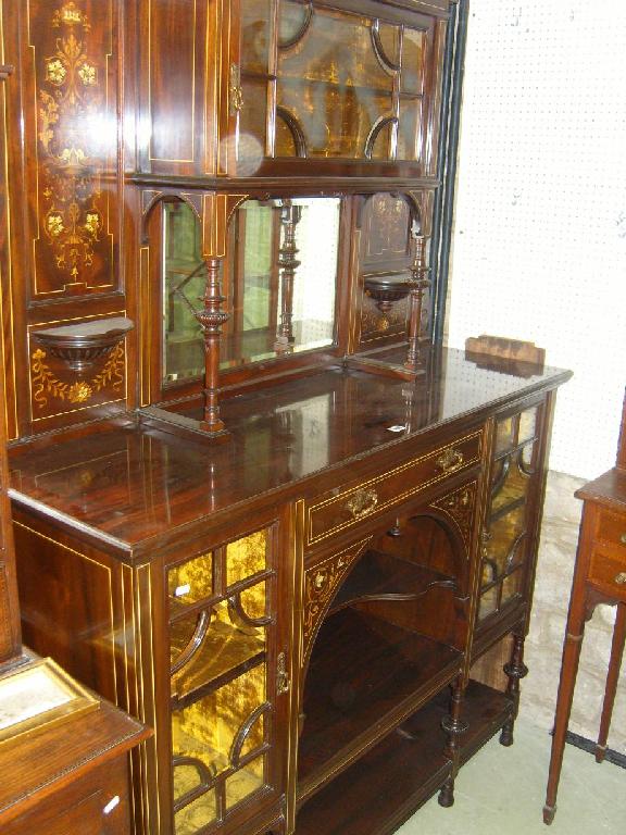 Appraisal: An inlaid Edwardian rosewood chiffonier of full height the lower