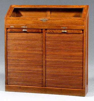 Appraisal: Oak tambour-door map case hinged beveled glass top two locking