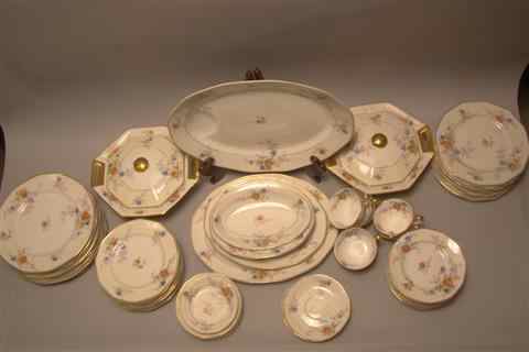 Appraisal: LIMOGES HAVILAND CHINA SET floral with gold edge including cups