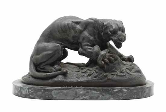 Appraisal: A Patinated Bronze Figural Group depicting a lion with a