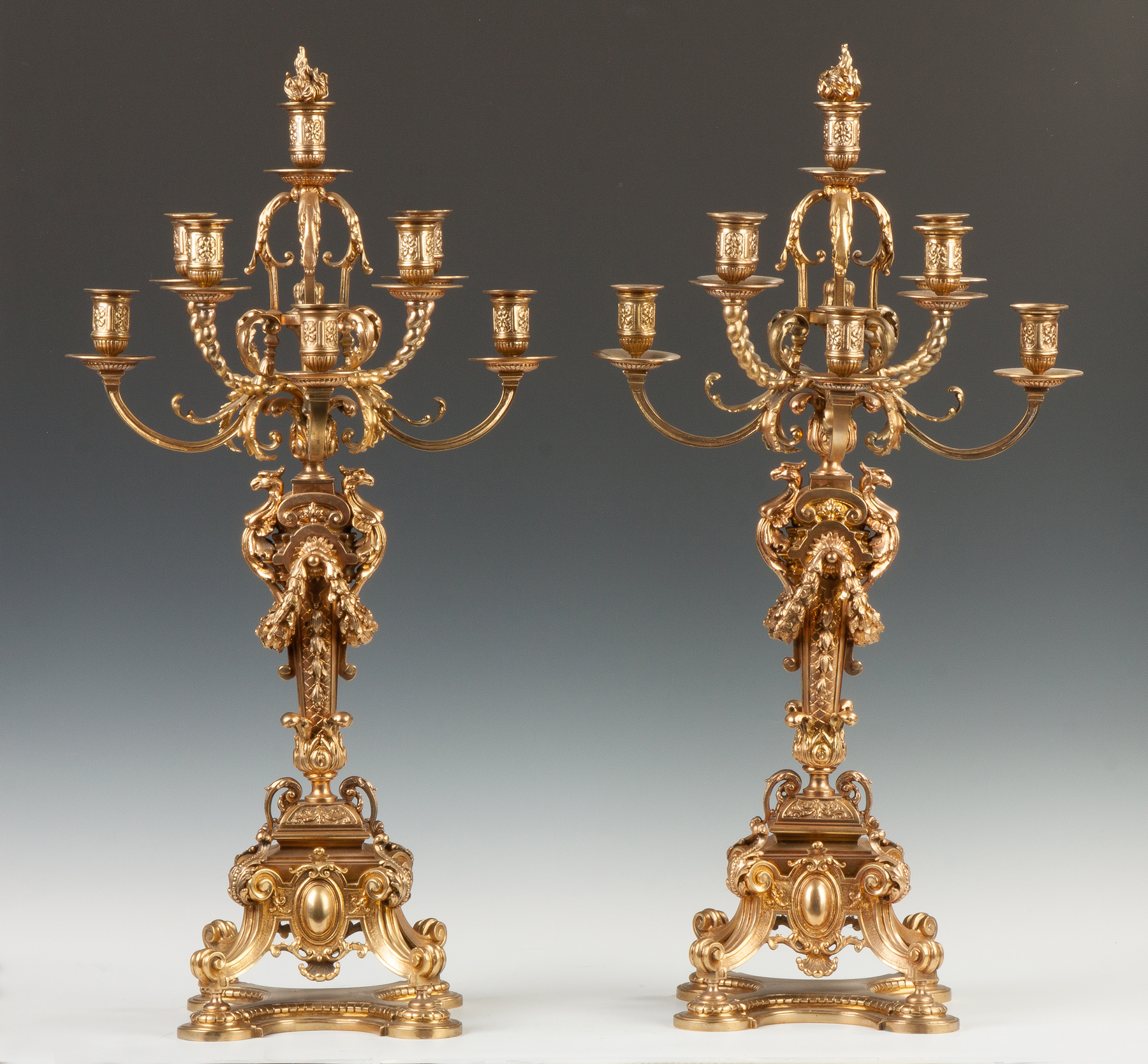 Appraisal: Pair of French Seven Arm Bronze Candelabras th century With