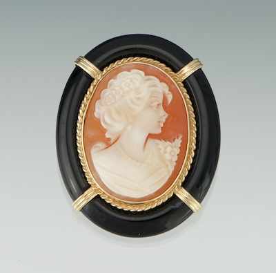 Appraisal: A Carved Shell and Onyx Cameo Brooch-Pendant ca Carved shell