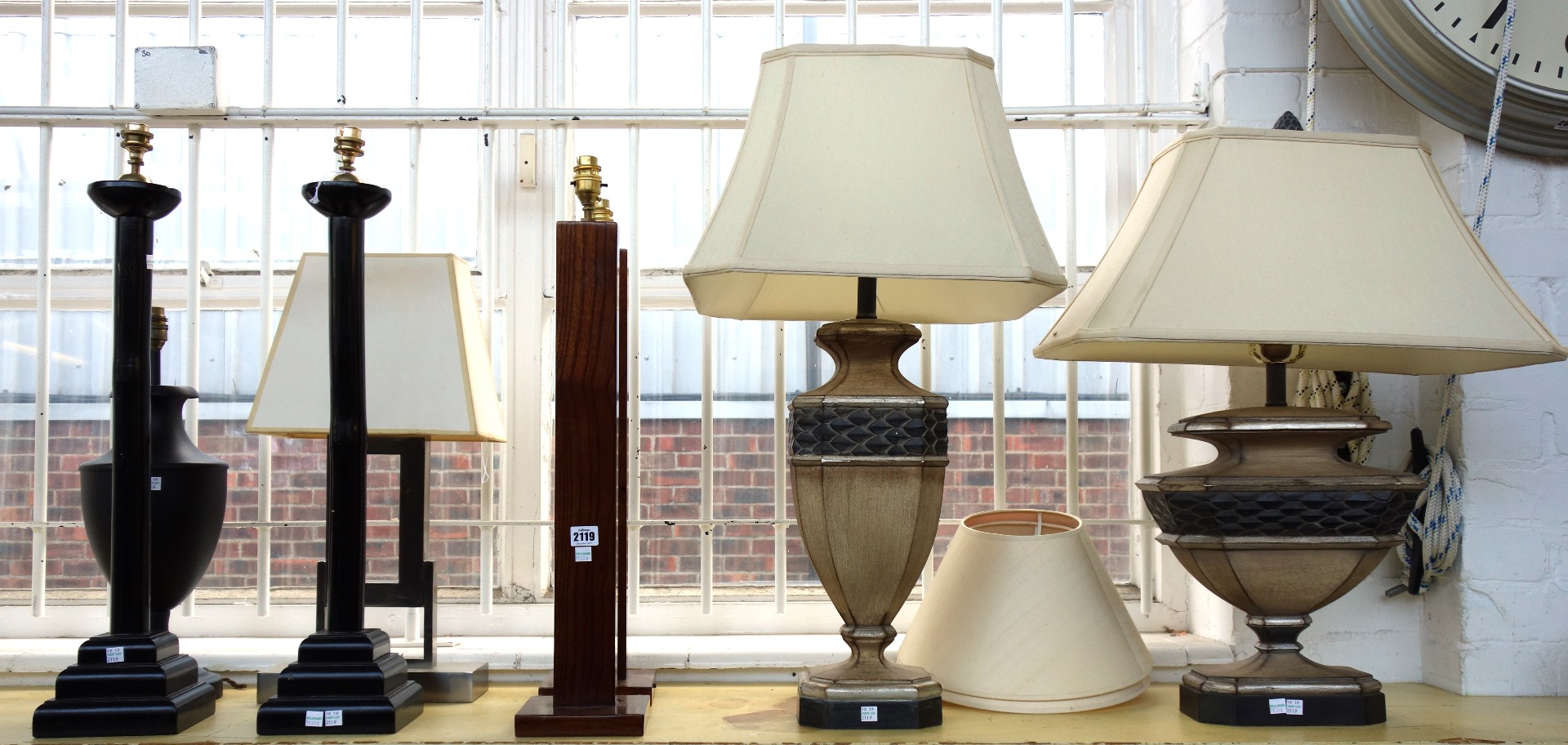 Appraisal: A pair of stained beech table lamps of contemporary form