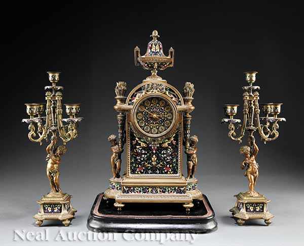 Appraisal: A French Champlev Enamel and Bronze Three-Piece Clock Garniture c