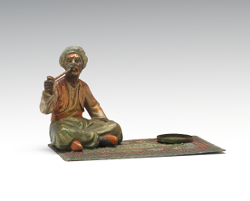 Appraisal: AUSTRIAN COLD PAINTED METAL FIGURE OF AN ARAB MAN ON