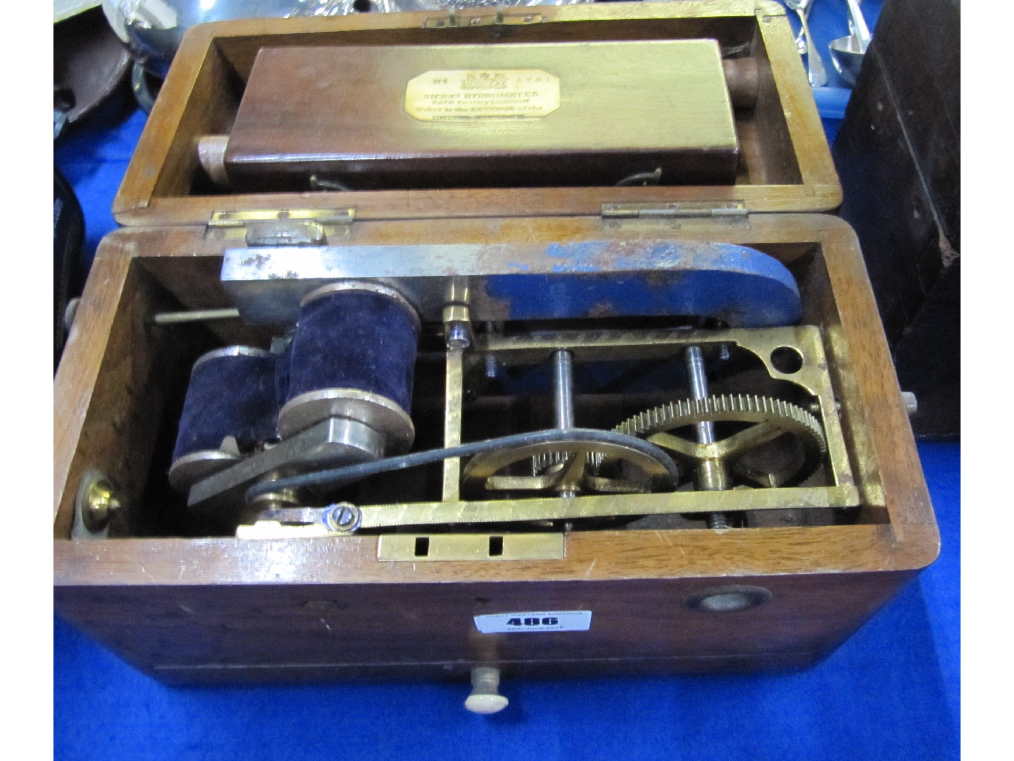 Appraisal: A lot comprising a cased instrument and a hydrometer in