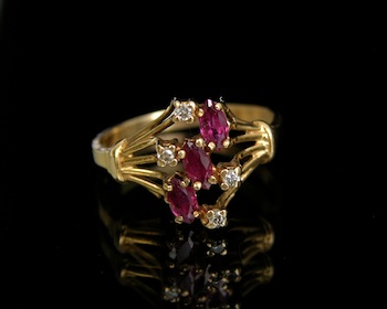 Appraisal: A Ruby and Diamond Cluster Ring k yellow gold open