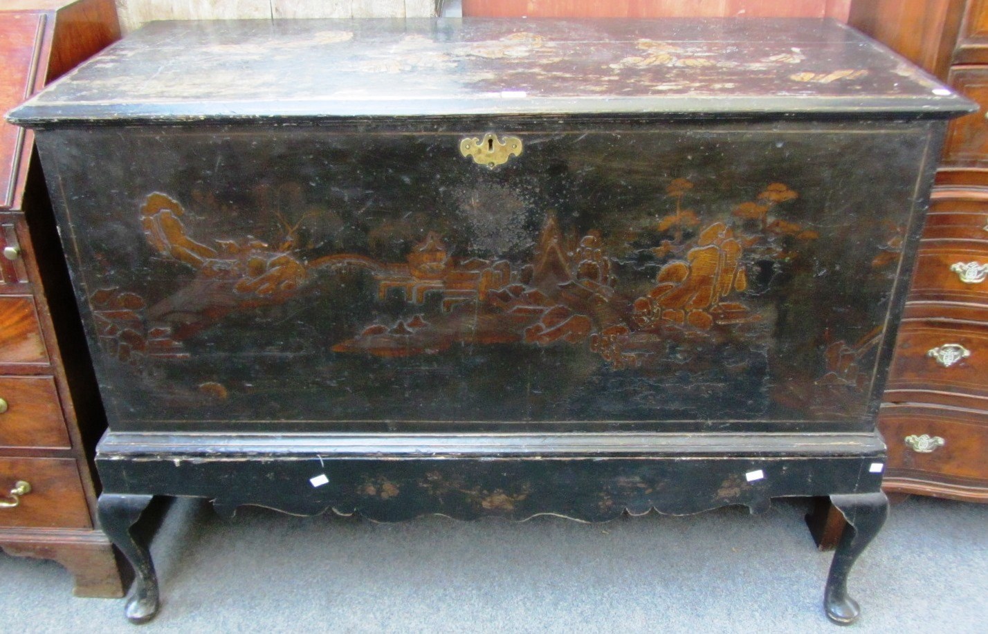 Appraisal: A mid th century black and gilt Japanned chest on