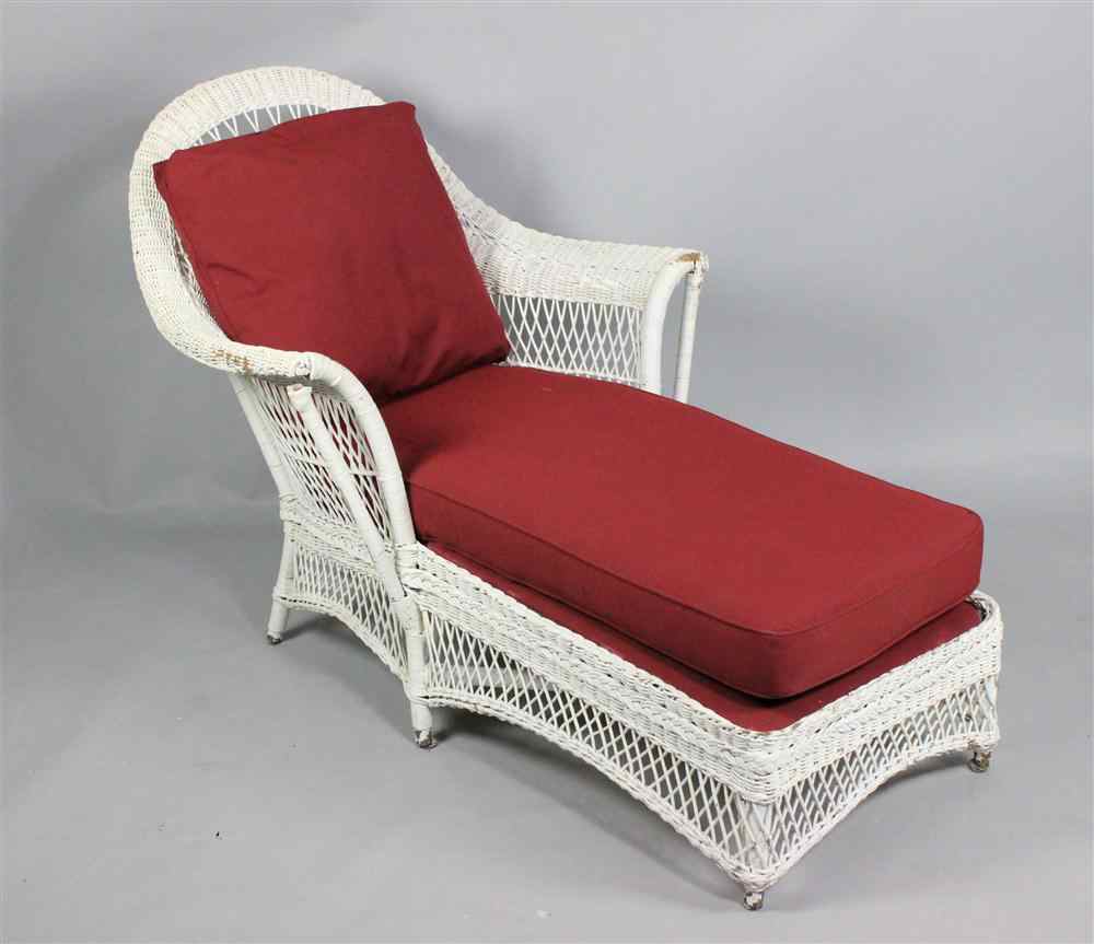 Appraisal: WHITE WICKER CHAISE having a loose back and seat cushion