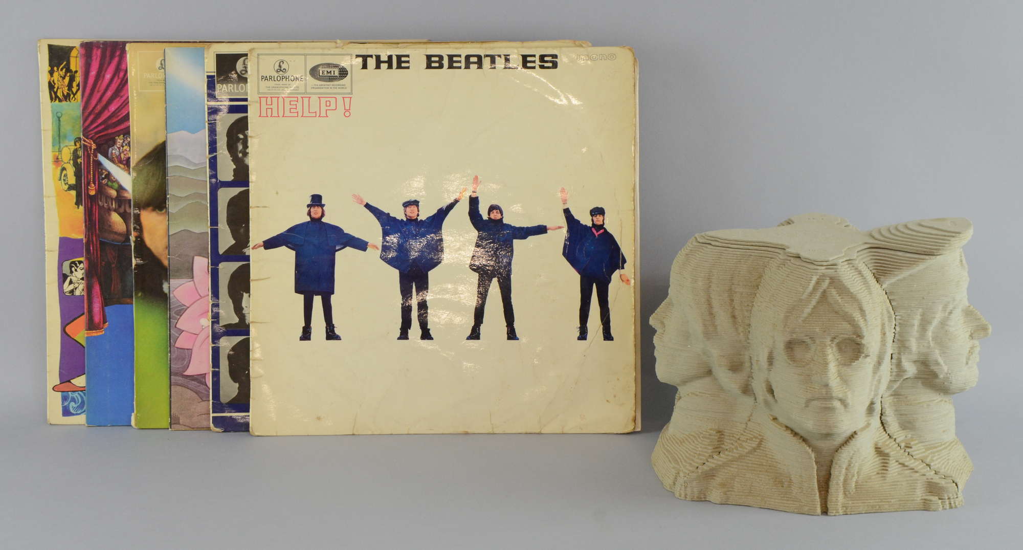 Appraisal: The Beatles a cardboard sculpture by Gonzala Sanchez five LPs