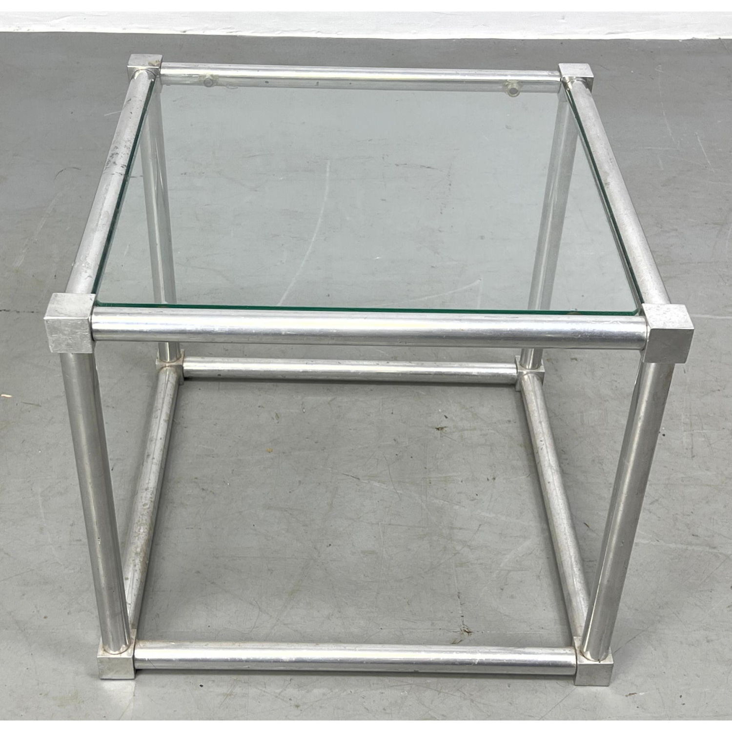 Appraisal: Small Aluminum and Glass Side Table Cube form Dimensions H