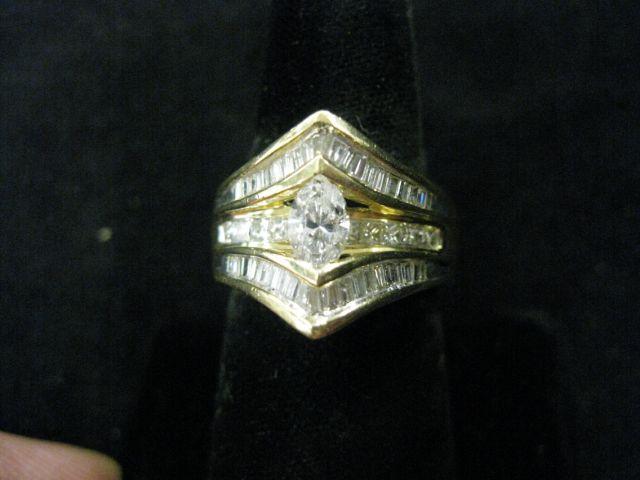 Appraisal: Diamond Ring marquise cut diamond with princess cut baguette diamonds